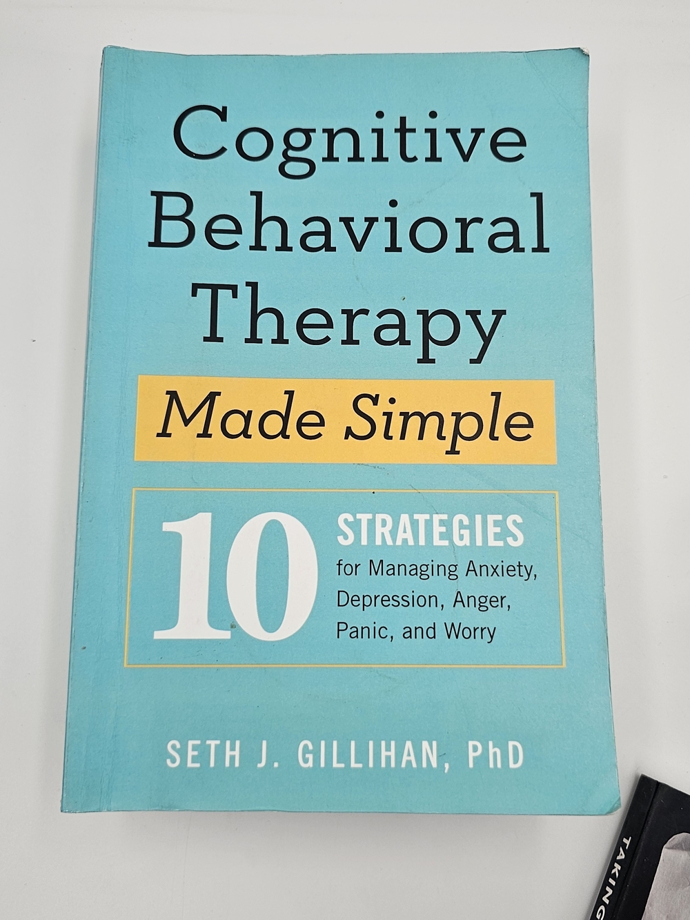 Stack of Mindfulness & CBT Books in Black, Teal, Blue, and Cream - Picture 4 of 14